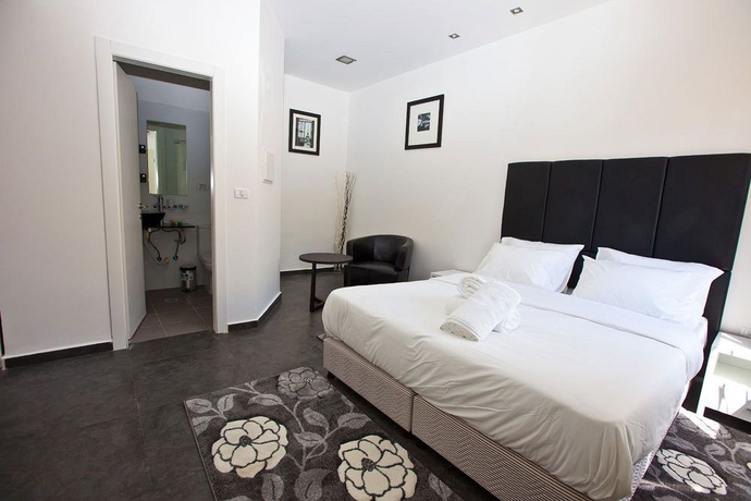 Imagen de la habitación del Hotel Geula Suites. Foto 9