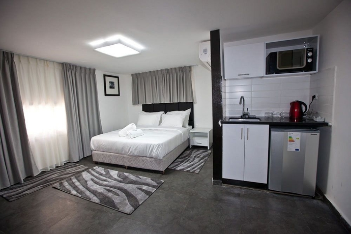 Imagen de la habitación del Hotel Geula Suites. Foto 10