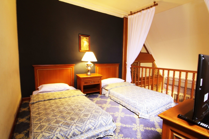 Imagen de la habitación del Hotel Geulis Boutique And Cafe. Foto 6