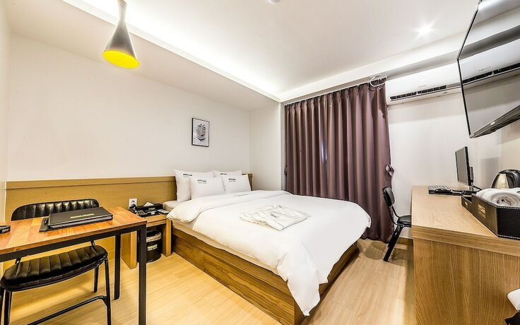 Imagen de la habitación del Hotel Geumjeong Band. Foto 15