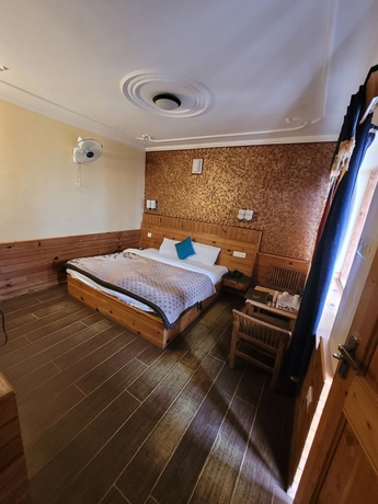 Imagen de la habitación del Hotel Gezellig Inn - Golden Apple. Foto 11