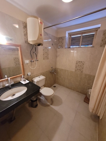 Imagen de la habitación del Hotel Gezellig Inn - Golden Apple. Foto 12