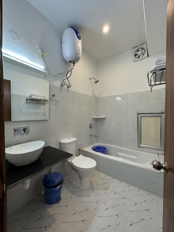 Imagen de la habitación del Hotel Gezellig Inn - Magic Mountain. Foto 12