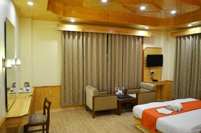 Imagen de la habitación del Hotel Gezellig Inn Tree Hill Cottages and Kanyal Villas. Foto 23