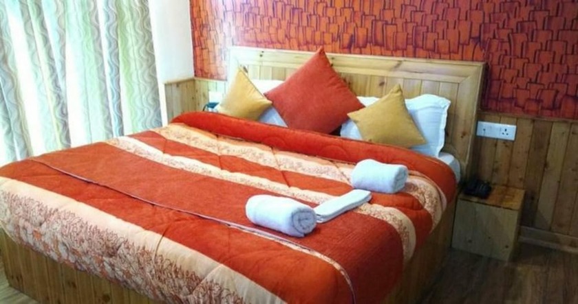 Imagen de la habitación del Hotel Gezellig Inn - Vardhan Hills. Foto 15