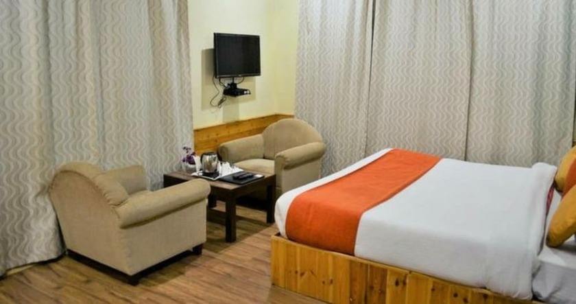 Imagen de la habitación del Hotel Gezellig Inn - Vardhan Hills. Foto 16
