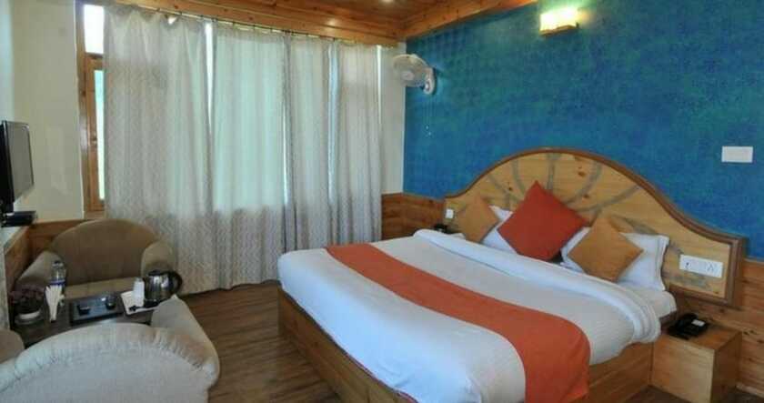 Imagen de la habitación del Hotel Gezellig Inn - Vardhan Hills. Foto 17