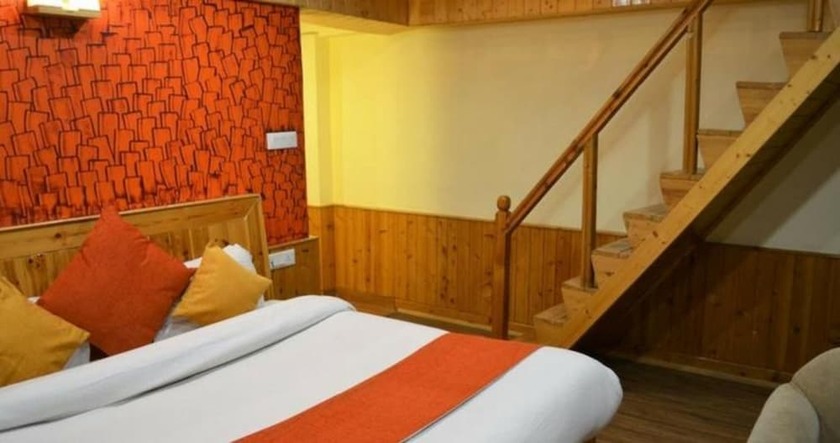 Imagen de la habitación del Hotel Gezellig Inn - Vardhan Hills. Foto 20