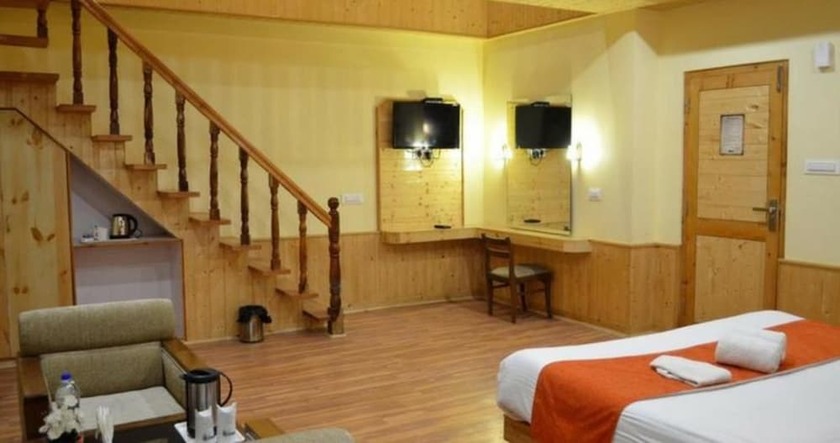 Imagen de la habitación del Hotel Gezellig Inn - Vardhan Hills. Foto 21