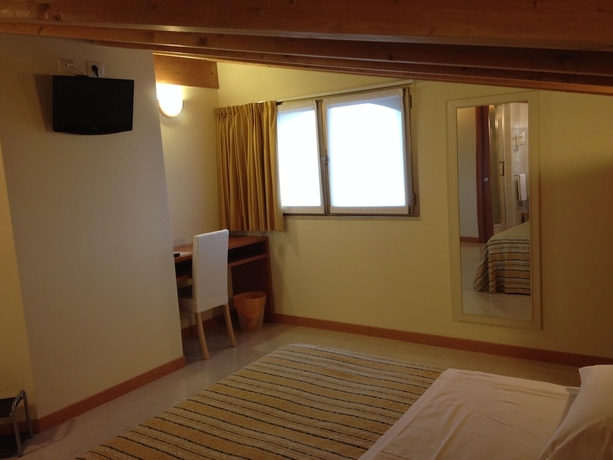 Imagen de la habitación del Hotel Gf. Foto 6