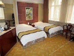 Imagen de la habitación del Hotel Gfour Holiday. Foto 4