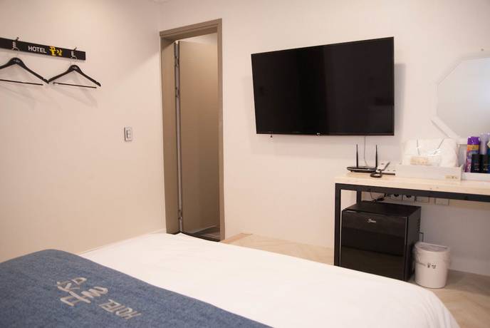 Imagen de la habitación del Hotel Ggulzam. Foto 9