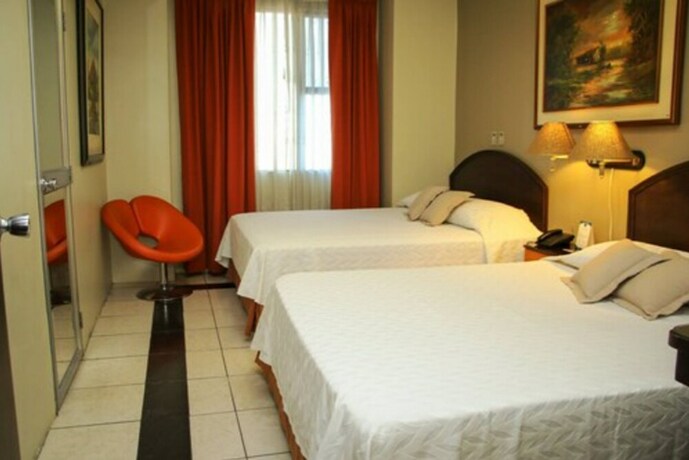 Imagen de la habitación del Hotel Gh Alexander. Foto 14