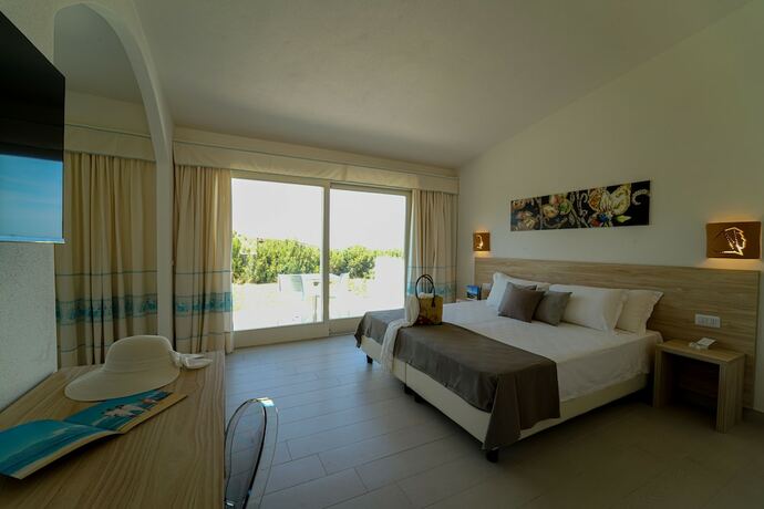 Imagen de la habitación del Hotel Gh Santina Resort. Foto 19