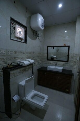 Imagen de la habitación del Hotel Ghai Residency. Foto 11