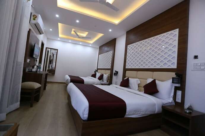 Imagen de la habitación del Hotel Ghai Residency. Foto 13
