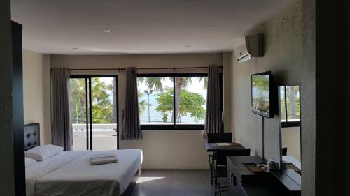 Imagen de la habitación del Hotel G.i Lodge. Foto 4