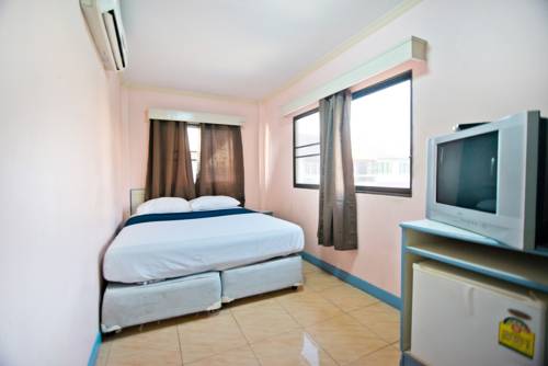 Imagen de la habitación del Hotel G.i Lodge. Foto 10