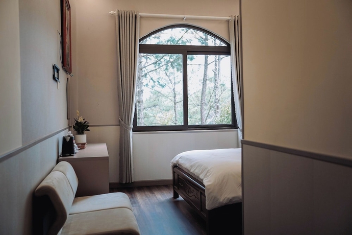 Imagen de la habitación del Hotel Gia An Dalat. Foto 10