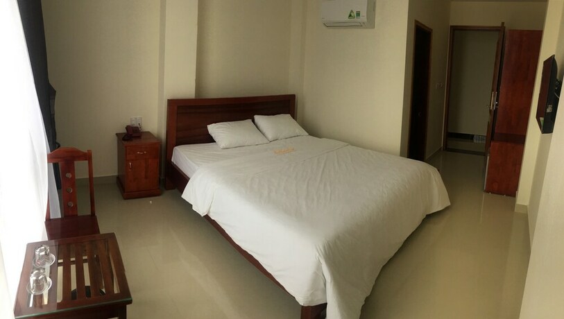 Imagen de la habitación del Hotel Gia Nguyen Dong Hoi. Foto 26