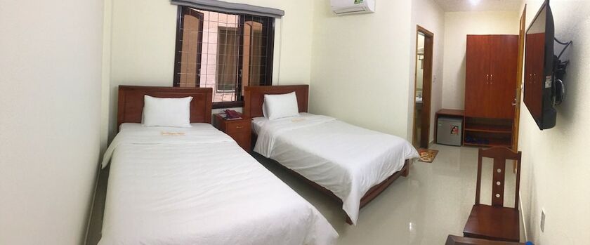 Imagen de la habitación del Hotel Gia Nguyen Dong Hoi. Foto 29