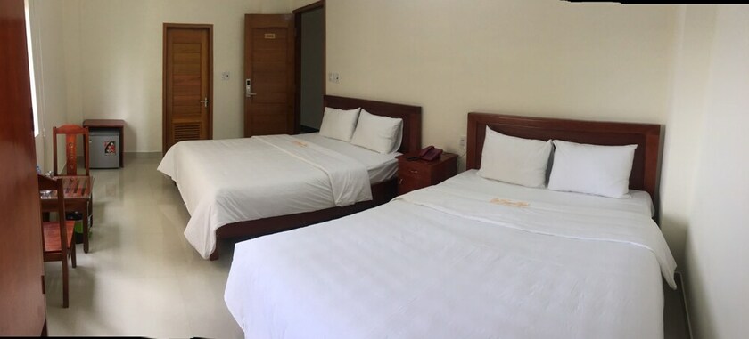 Imagen de la habitación del Hotel Gia Nguyen Dong Hoi. Foto 31