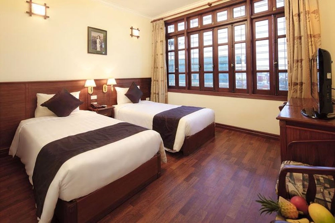 Imagen de la habitación del Hotel Gia Thinh. Foto 12