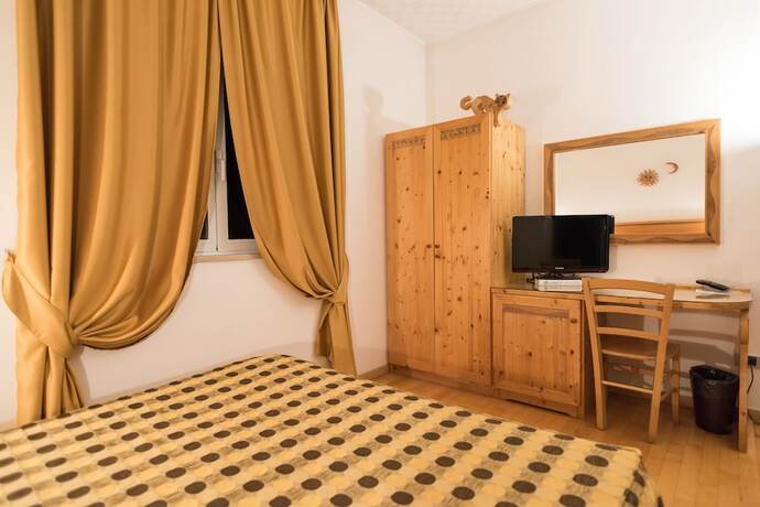 Imagen de la habitación del Hotel Gialletti. Foto 18