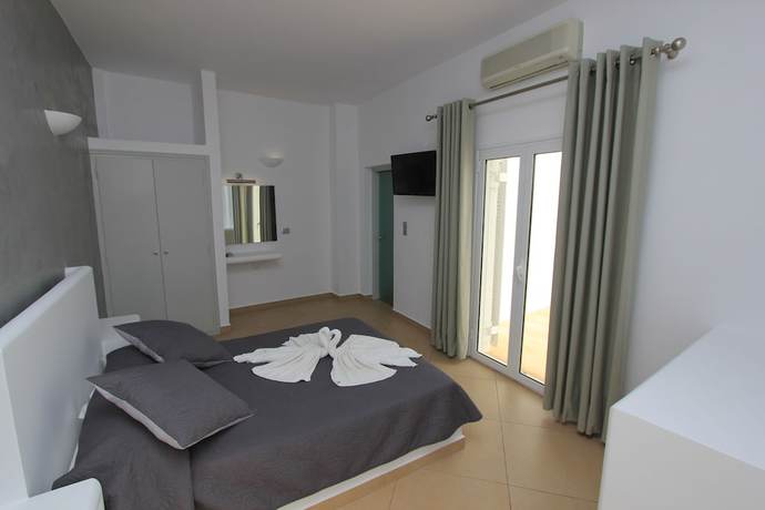 Imagen de la habitación del Hotel Gianna Suites. Foto 2