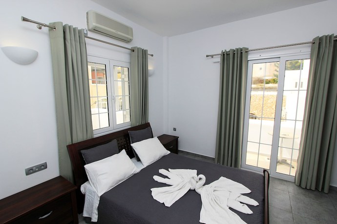 Imagen de la habitación del Hotel Gianna Suites. Foto 4