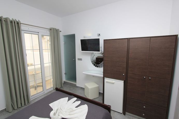 Imagen de la habitación del Hotel Gianna Suites. Foto 11