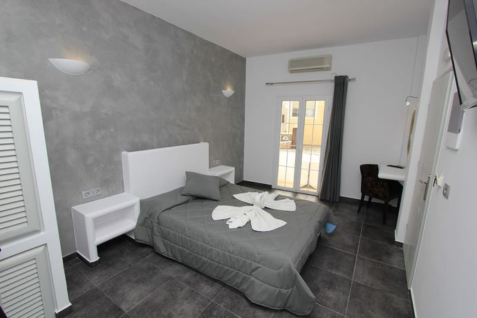 Imagen de la habitación del Hotel Gianna Suites. Foto 12