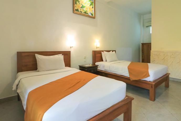Imagen de la habitación del Hotel Gianyar. Foto 8