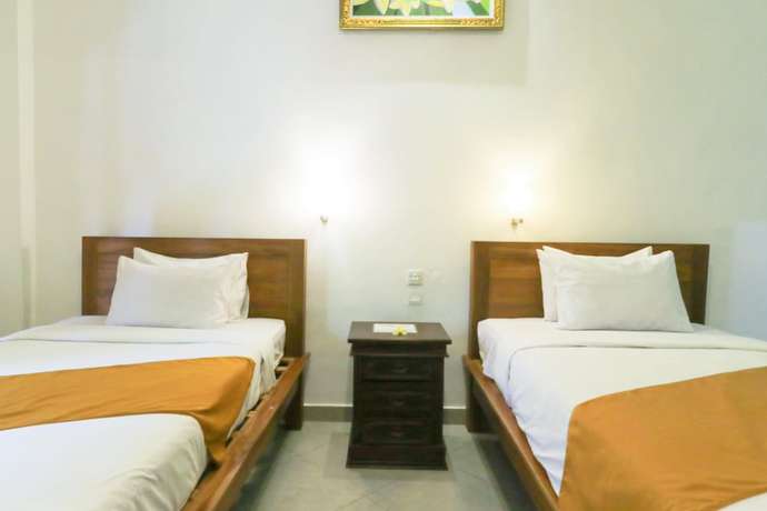 Imagen de la habitación del Hotel Gianyar. Foto 10
