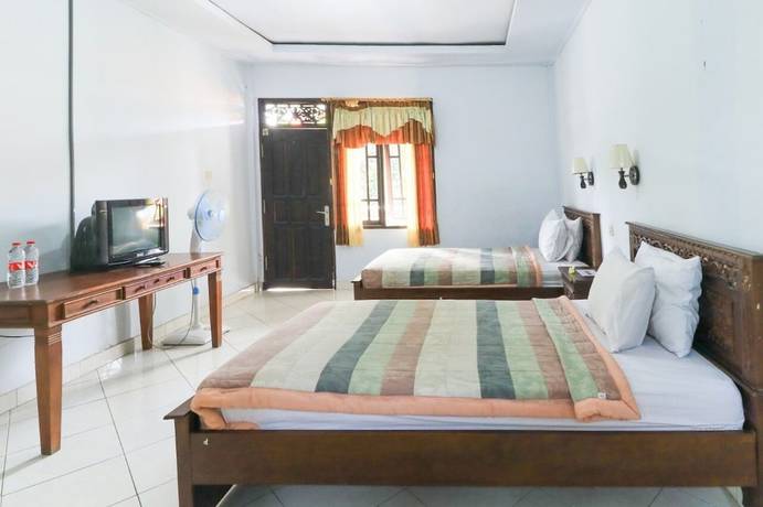 Imagen de la habitación del Hotel Gianyar. Foto 13