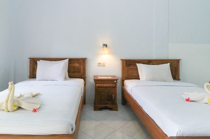 Imagen de la habitación del Hotel Gianyar. Foto 15