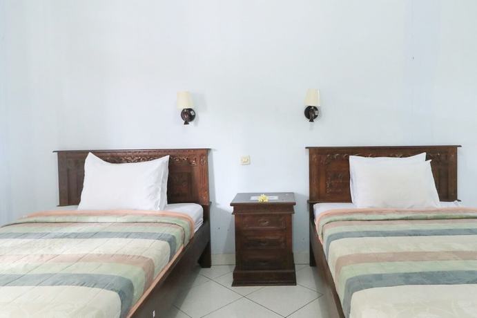 Imagen de la habitación del Hotel Gianyar. Foto 16