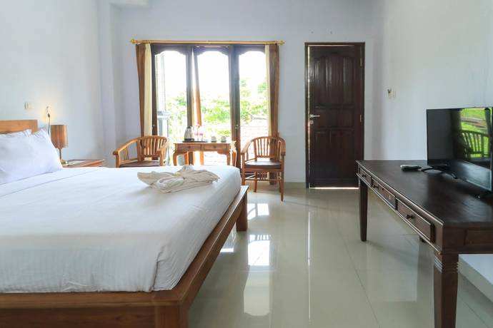 Imagen de la habitación del Hotel Gianyar. Foto 19