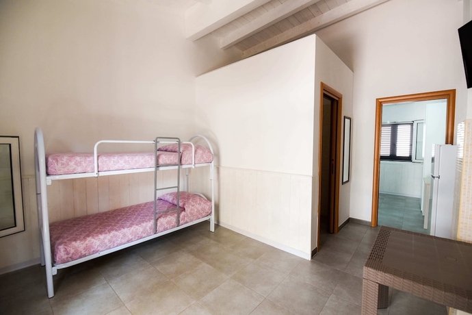 Imagen de la habitación del Hotel Giardini Sausari Residence. Foto 3