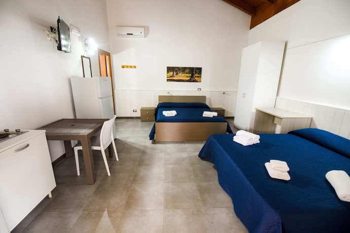 Imagen de la habitación del Hotel Giardini Sausari Residence. Foto 4