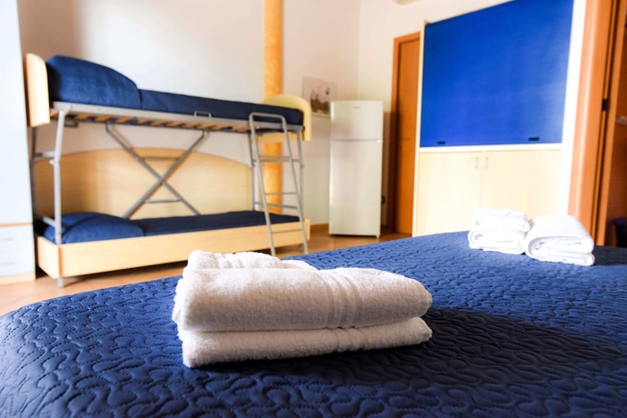 Imagen de la habitación del Hotel Giardini Sausari Residence. Foto 5