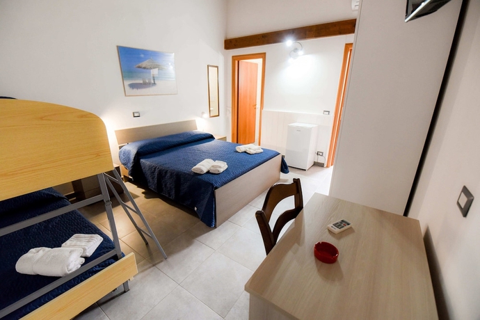 Imagen de la habitación del Hotel Giardini Sausari Residence. Foto 6