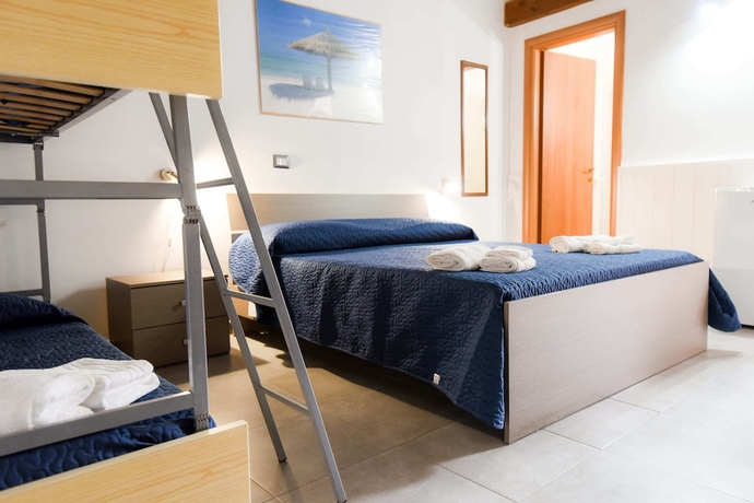 Imagen de la habitación del Hotel Giardini Sausari Residence. Foto 7