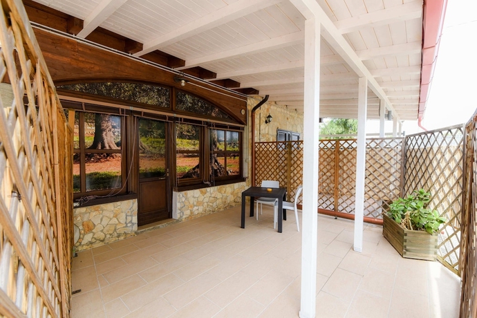 Imagen de la habitación del Hotel Giardini Sausari Residence. Foto 11