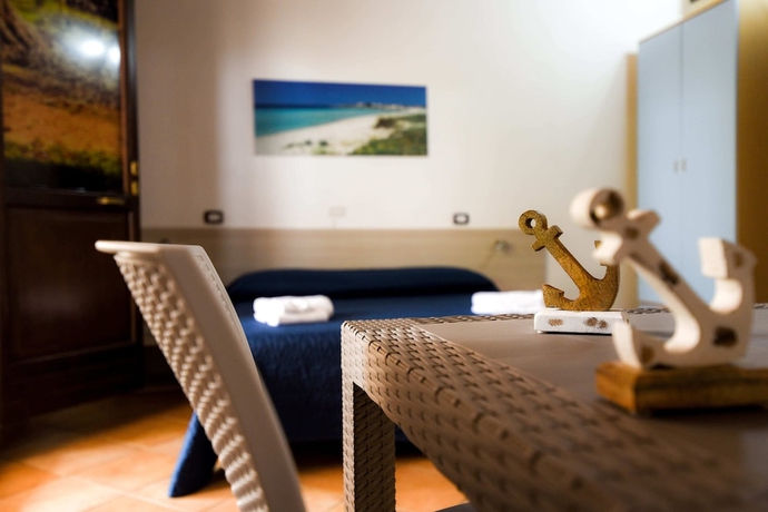 Imagen de la habitación del Hotel Giardini Sausari Residence. Foto 13