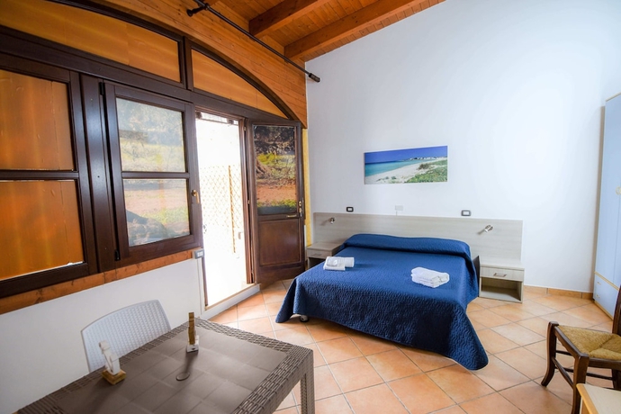 Imagen de la habitación del Hotel Giardini Sausari Residence. Foto 15