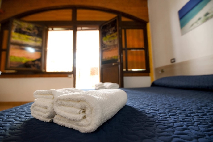 Imagen de la habitación del Hotel Giardini Sausari Residence. Foto 16