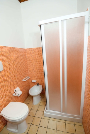 Imagen de la habitación del Hotel Giardini Sausari Residence. Foto 17