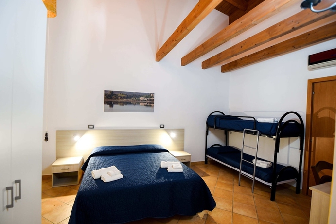 Imagen de la habitación del Hotel Giardini Sausari Residence. Foto 19