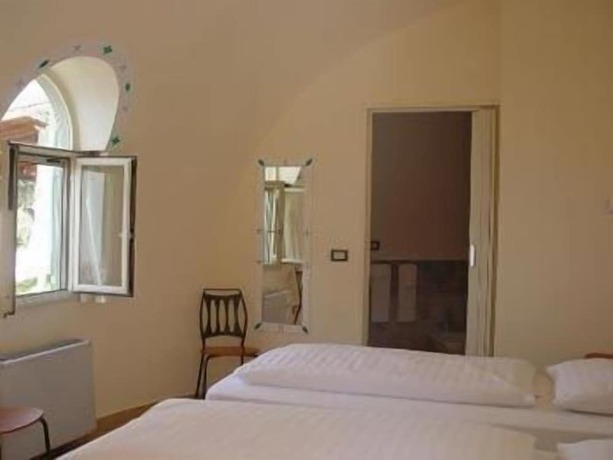 Imagen de la habitación del Hotel Giardino di Sicilia. Foto 17